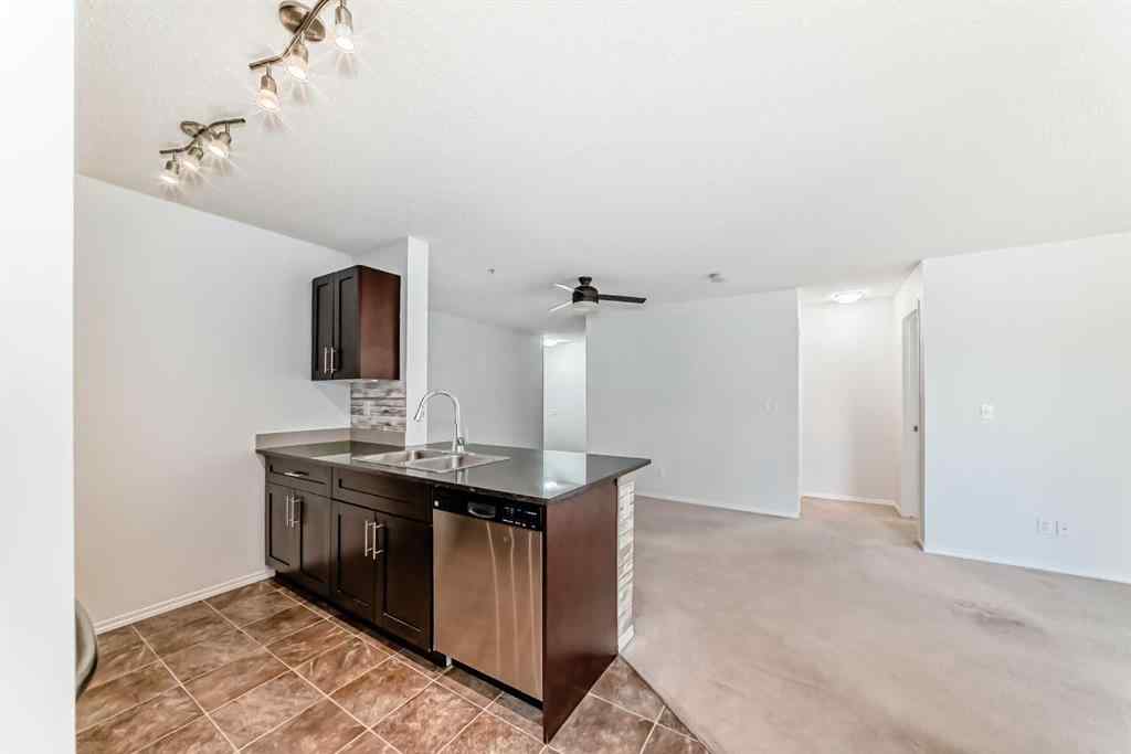 MLS® A2248445 - Unit #9113 403 Mackenzie Way SW in Downtown Airdrie, Residential