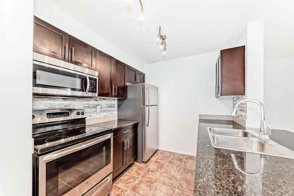 MLS® A2248445 - Unit #9113 403 Mackenzie Way SW in Downtown Airdrie, Residential