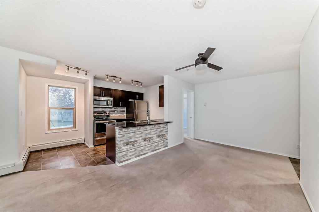 MLS® A2248445 - Unit #9113 403 Mackenzie Way SW in Downtown Airdrie, Residential