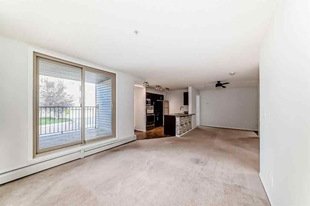 MLS® A2248445 - Unit #9113 403 Mackenzie Way SW in Downtown Airdrie, Residential