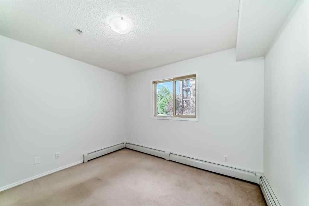 MLS® A2248445 - Unit #9113 403 Mackenzie Way SW in Downtown Airdrie, Residential
