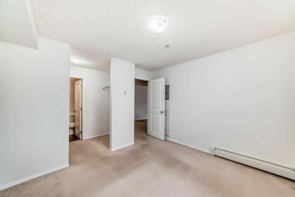 MLS® A2248445 - Unit #9113 403 Mackenzie Way SW in Downtown Airdrie, Residential