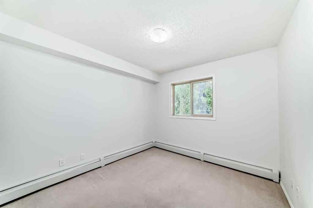 MLS® A2248445 - Unit #9113 403 Mackenzie Way SW in Downtown Airdrie, Residential