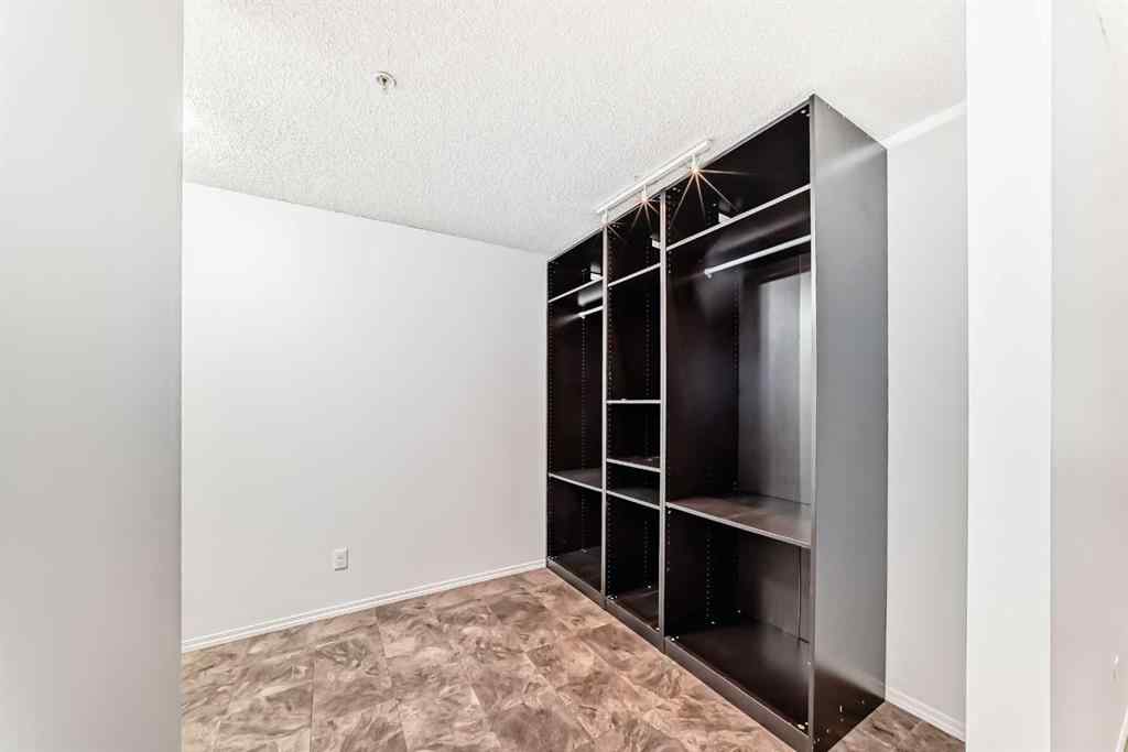 MLS® A2248445 - Unit #9113 403 Mackenzie Way SW in Downtown Airdrie, Residential