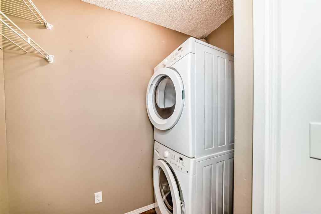 MLS® A2248445 - Unit #9113 403 Mackenzie Way SW in Downtown Airdrie, Residential