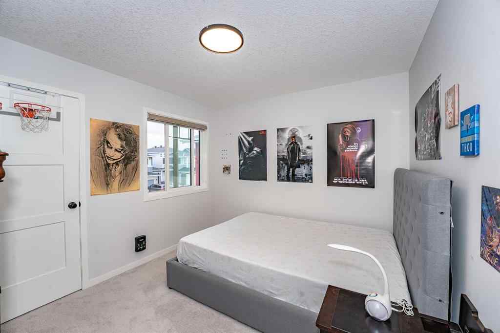 MLS® A2248453 - 120 Howse Road NE in Livingston Calgary, Residential