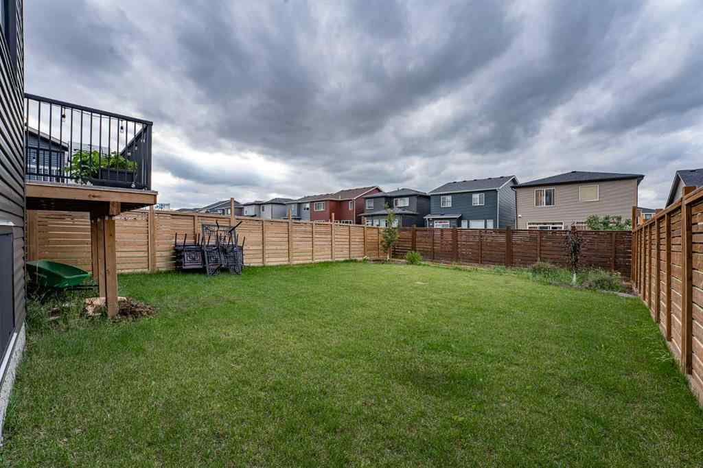 MLS® A2248453 - 120 Howse Road NE in Livingston Calgary, Residential