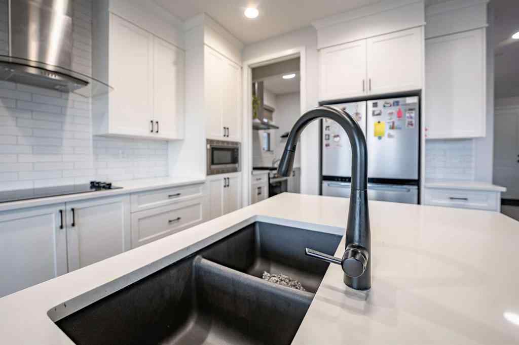 MLS® A2248453 - 120 Howse Road NE in Livingston Calgary, Residential