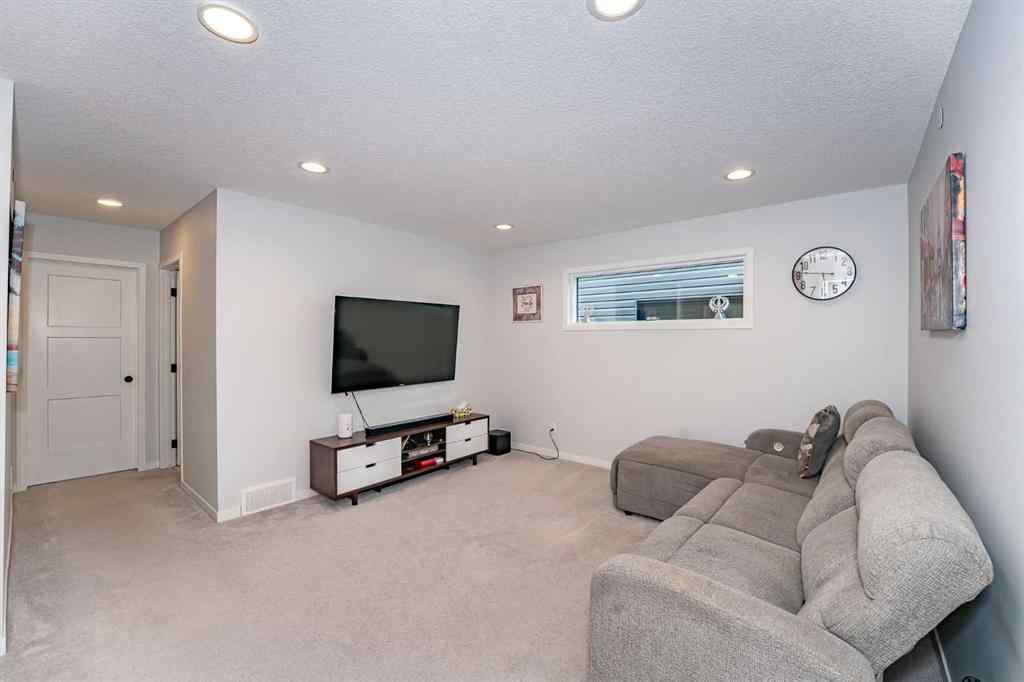 MLS® A2248453 - 120 Howse Road NE in Livingston Calgary, Residential