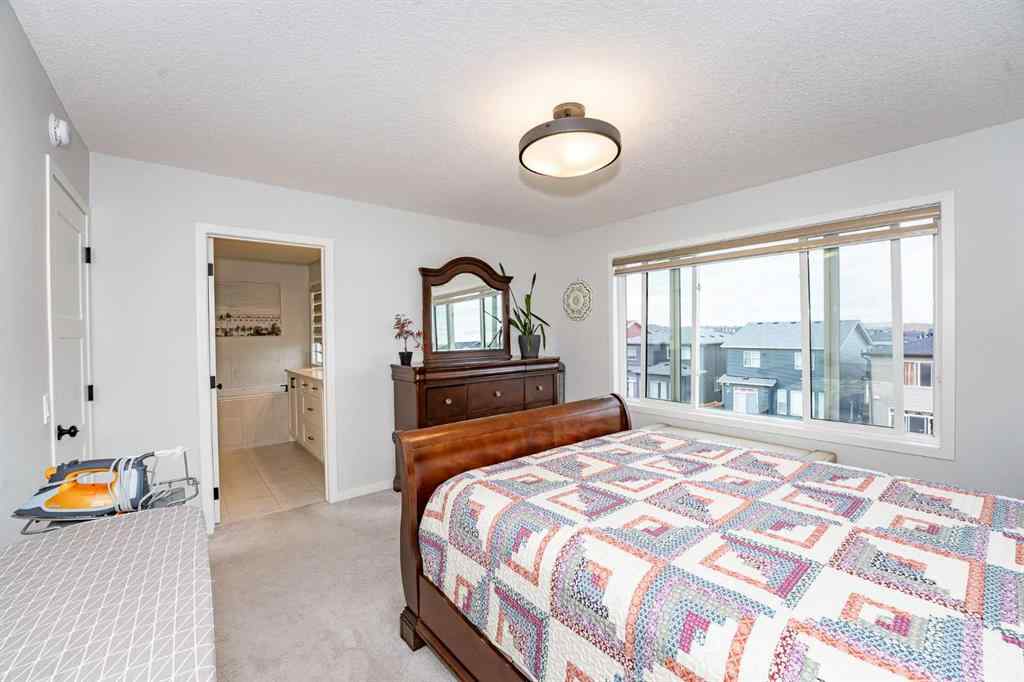 MLS® A2248453 - 120 Howse Road NE in Livingston Calgary, Residential