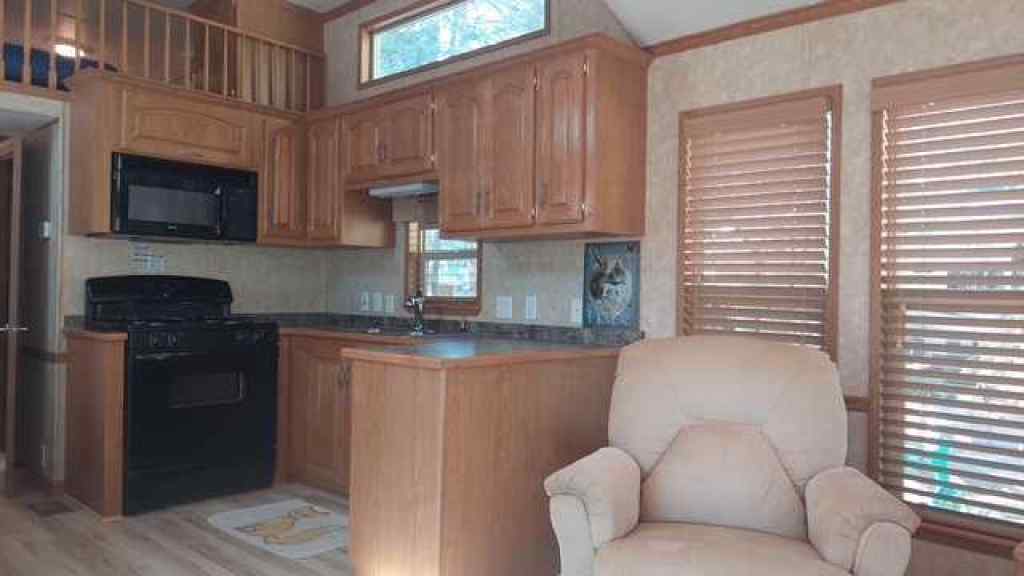 MLS® A2248461 - 3 Timber Crescent  in Tall Timber Rural Mountain View County, Land