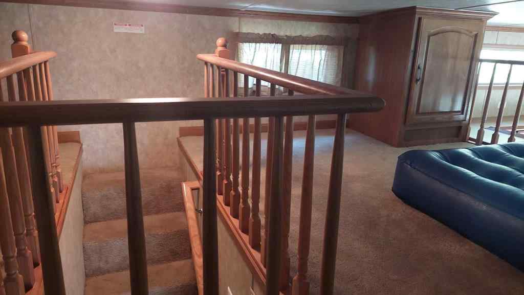 MLS® A2248461 - 3 Timber Crescent  in Tall Timber Rural Mountain View County, Land