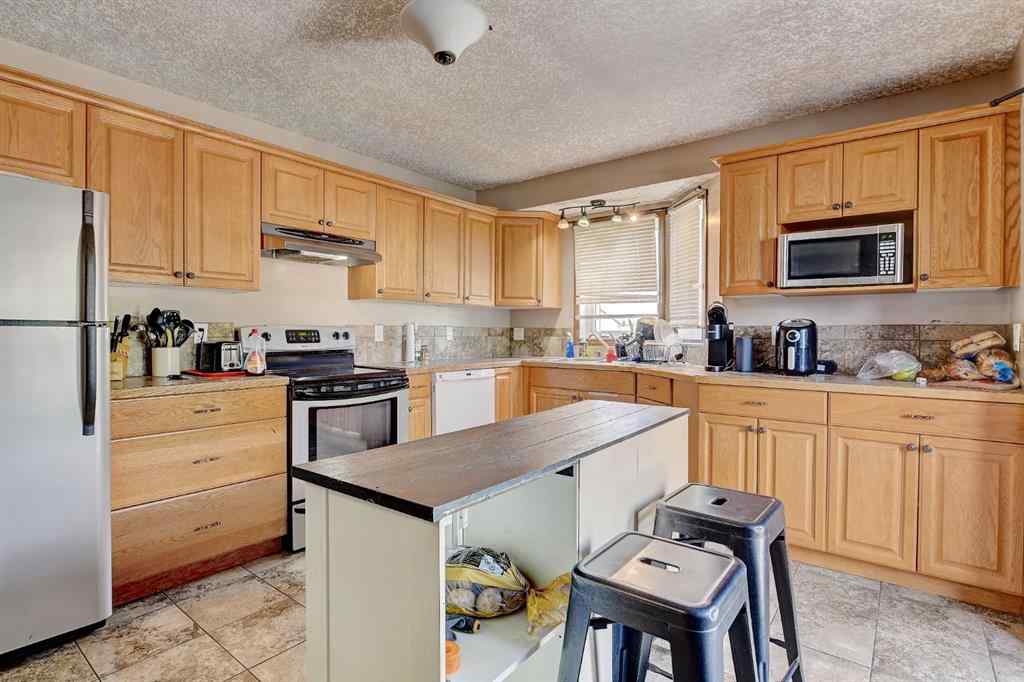 MLS® A2248509 - Unit #A & B 9273 94 Avenue  in Smith Grande Prairie, Residential