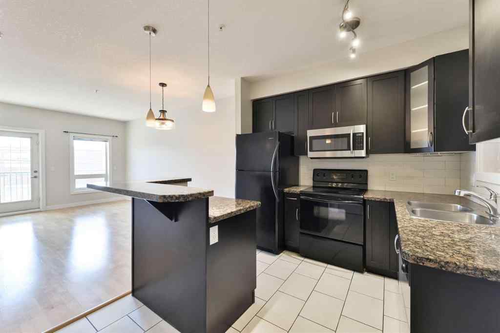 MLS® A2248512 - Unit #207 1108 15 Street SW in Sunalta Calgary, Residential