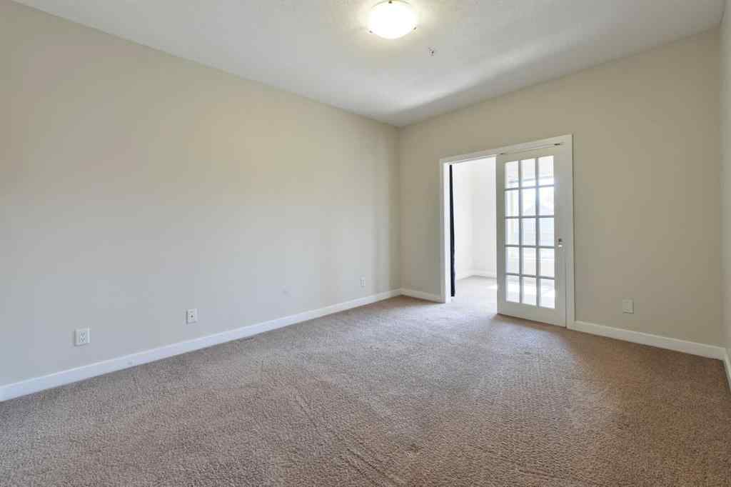 MLS® A2248512 - Unit #207 1108 15 Street SW in Sunalta Calgary, Residential