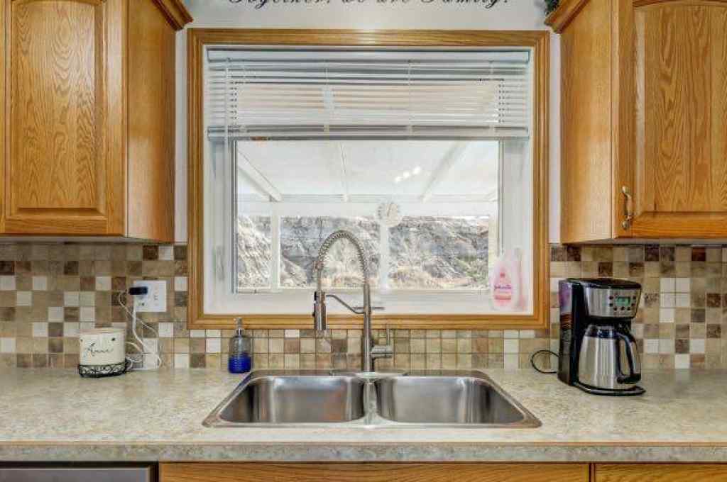 MLS® A2248523 - 1030 1 Street SW in Bankview Drumheller, Residential