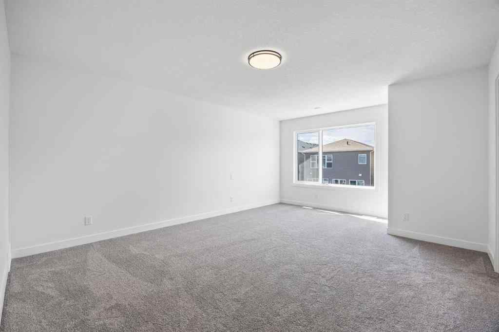 MLS® A2248539 - 137 Creekstone Landing SW in Pine Creek Calgary, Residential