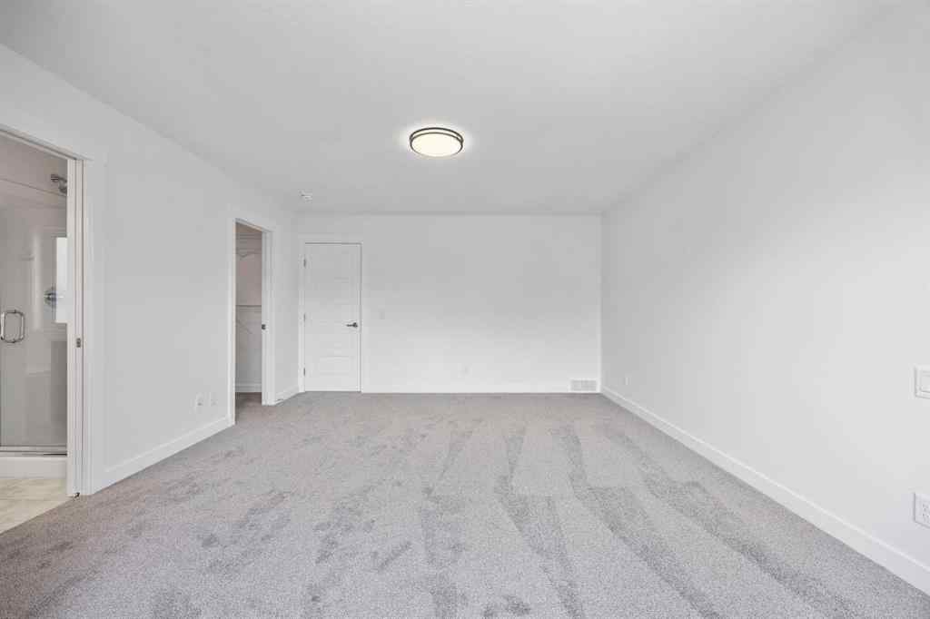 MLS® A2248539 - 137 Creekstone Landing SW in Pine Creek Calgary, Residential