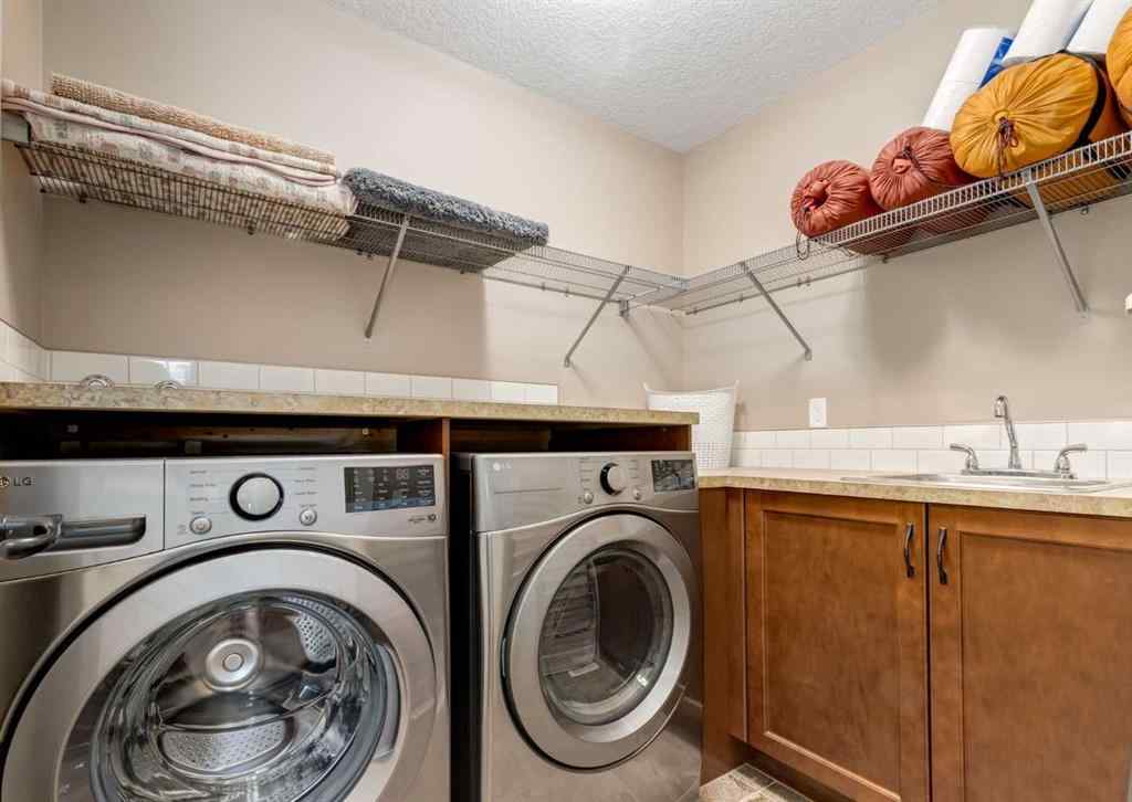 MLS® A2248548 - 72 Rockcliff Grove NW in Rocky Ridge Calgary, Residential