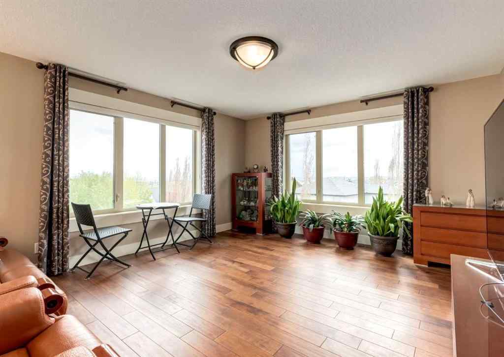 MLS® A2248548 - 72 Rockcliff Grove NW in Rocky Ridge Calgary, Residential
