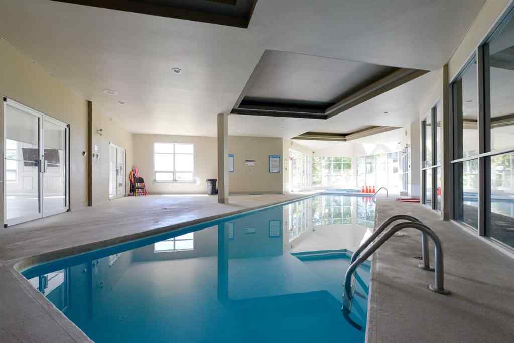 MLS® A2248553 - Unit #8 301 Village Mews SW in Patterson Calgary, Residential