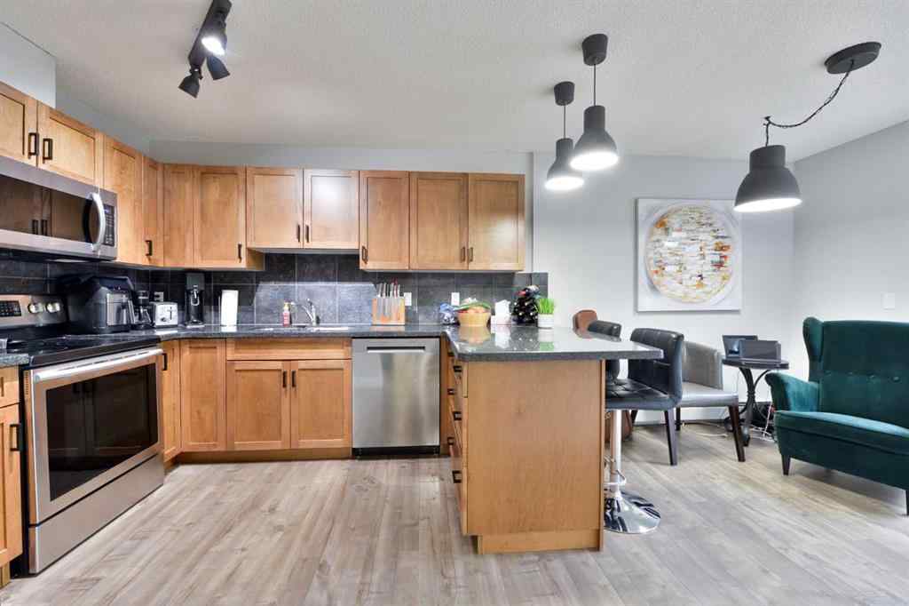 MLS® A2248553 - Unit #8 301 Village Mews SW in Patterson Calgary, Residential