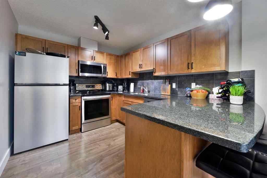 MLS® A2248553 - Unit #8 301 Village Mews SW in Patterson Calgary, Residential