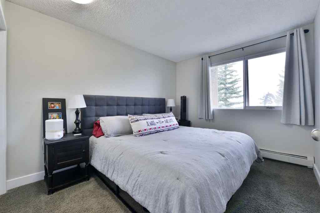 MLS® A2248553 - Unit #8 301 Village Mews SW in Patterson Calgary, Residential