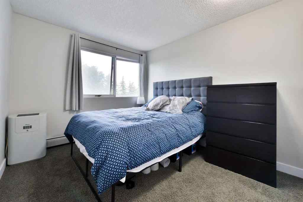 MLS® A2248553 - Unit #8 301 Village Mews SW in Patterson Calgary, Residential