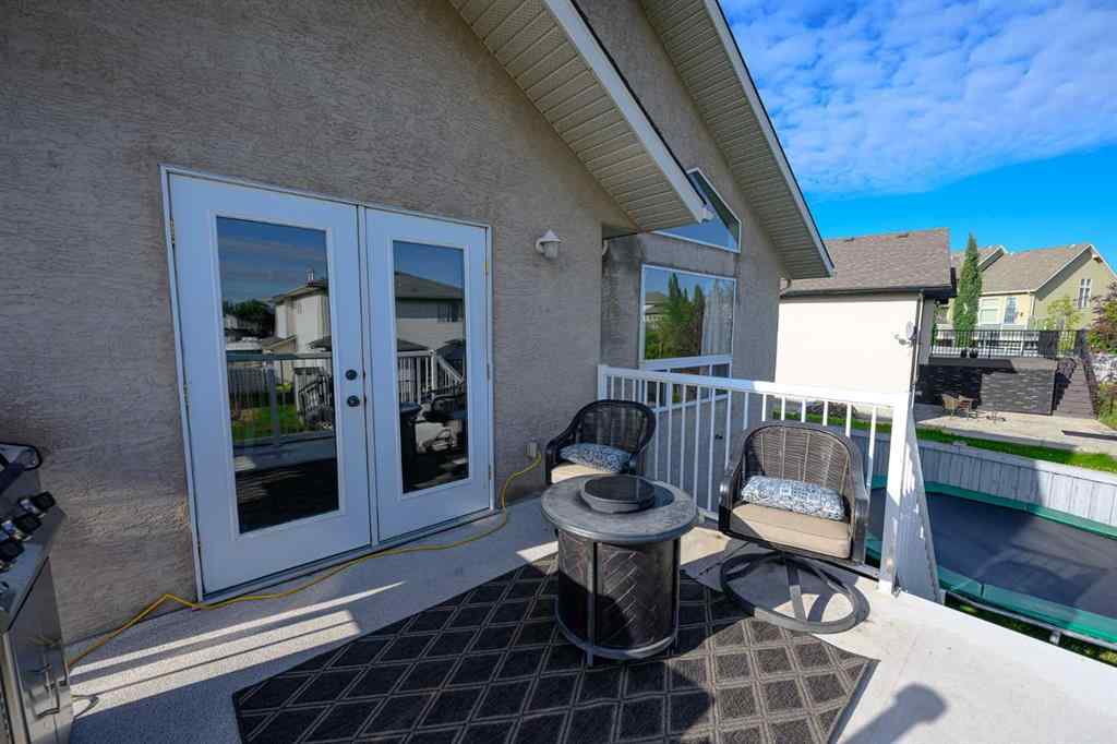 MLS® A2248568 - 8906 124 Avenue  in Crystal Lake Estates Grande Prairie, Residential