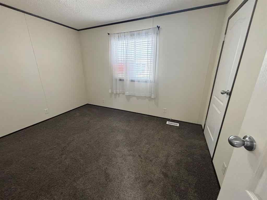 MLS® A2248644 - Unit #202 1101 84 Street NE in NONE Calgary, Mobile