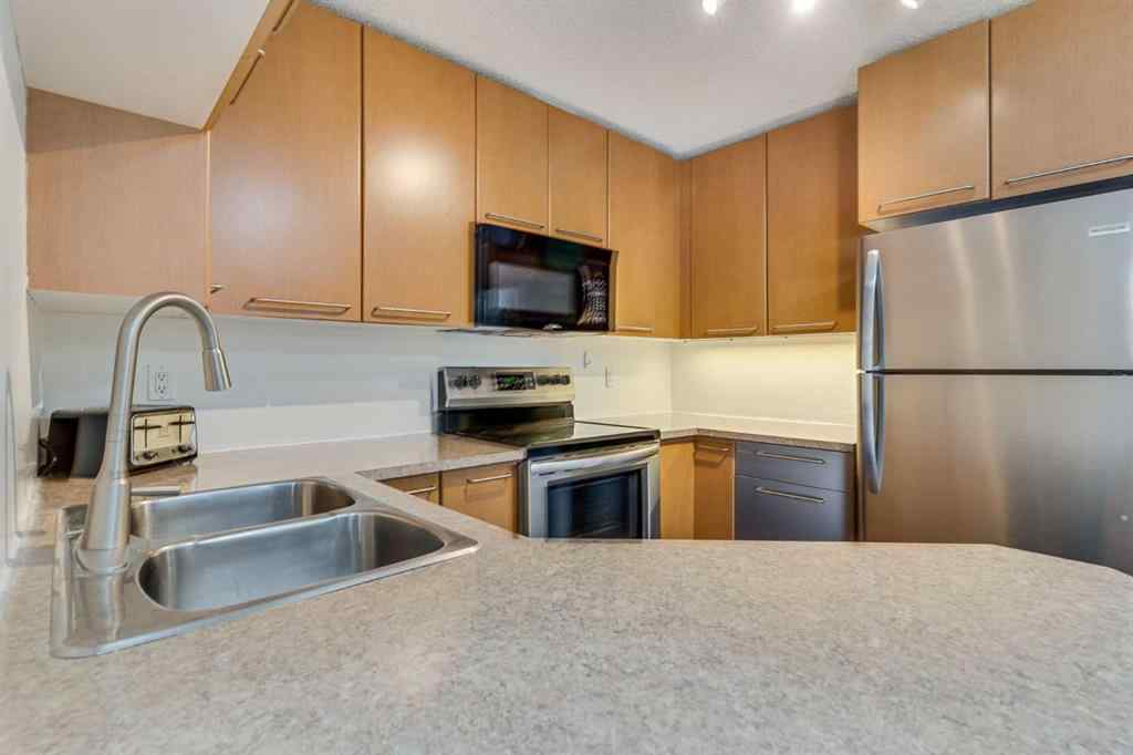 MLS® A2248647 - Unit #113 35 Richard Court SW in Lincoln Park Calgary, Residential