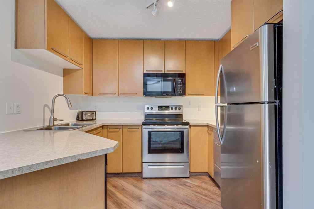 MLS® A2248647 - Unit #113 35 Richard Court SW in Lincoln Park Calgary, Residential