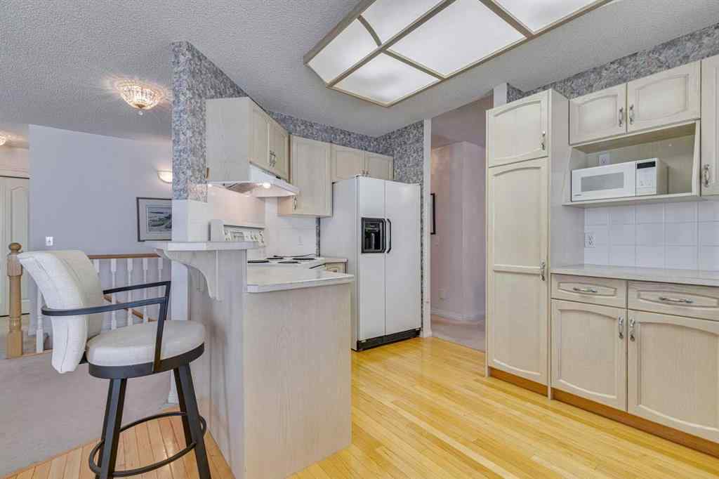MLS® A2248656 - 12 Sierra Morena Way SW in Signal Hill Calgary, Residential