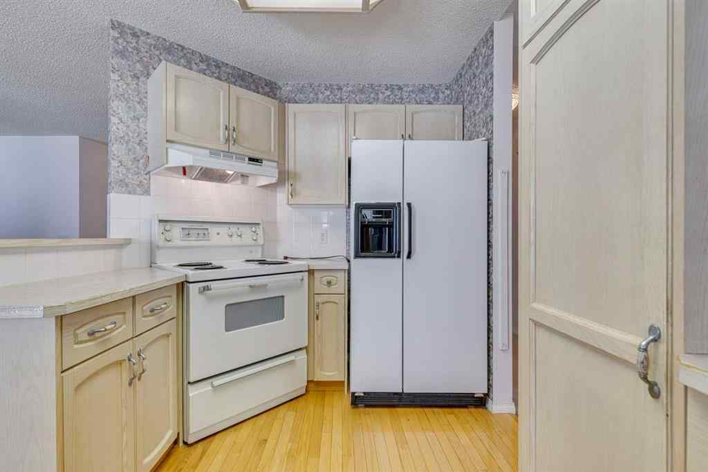 MLS® A2248656 - 12 Sierra Morena Way SW in Signal Hill Calgary, Residential