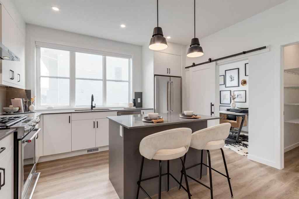 MLS® A2248664 - Unit #410 1453 Na'a Drive SW in Medicine Hill Calgary, Residential