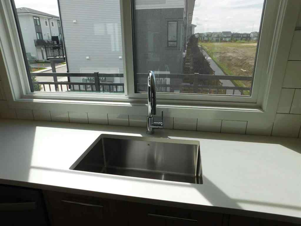 MLS® A2248672 - Unit #233 857 Belmont Drive SW in Belmont Calgary, Residential
