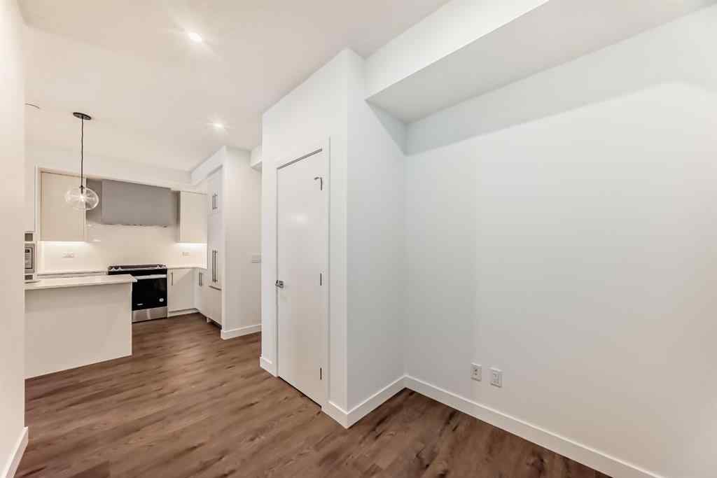 MLS® A2248724 - Unit #205 8370 Broadcast Avenue SW in West Springs Calgary, Residential