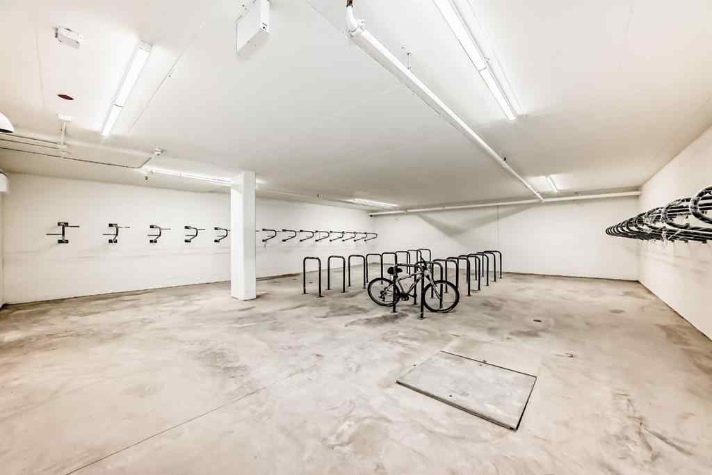 MLS® A2248724 - Unit #205 8370 Broadcast Avenue SW in West Springs Calgary, Residential