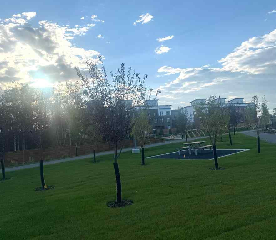 MLS® A2248724 - Unit #205 8370 Broadcast Avenue SW in West Springs Calgary, Residential