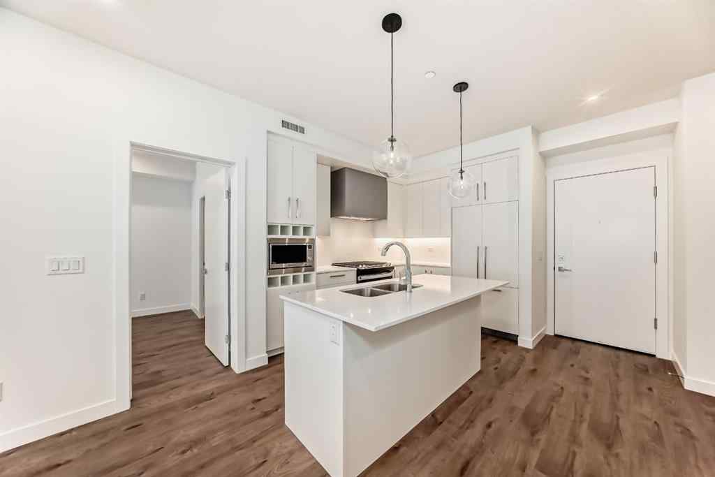 MLS® A2248724 - Unit #205 8370 Broadcast Avenue SW in West Springs Calgary, Residential