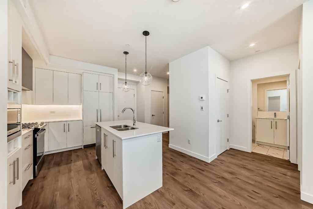 MLS® A2248724 - Unit #205 8370 Broadcast Avenue SW in West Springs Calgary, Residential