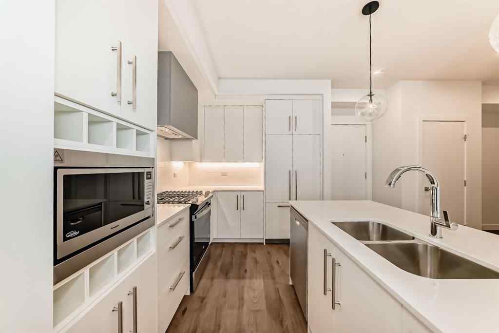 MLS® A2248724 - Unit #205 8370 Broadcast Avenue SW in West Springs Calgary, Residential