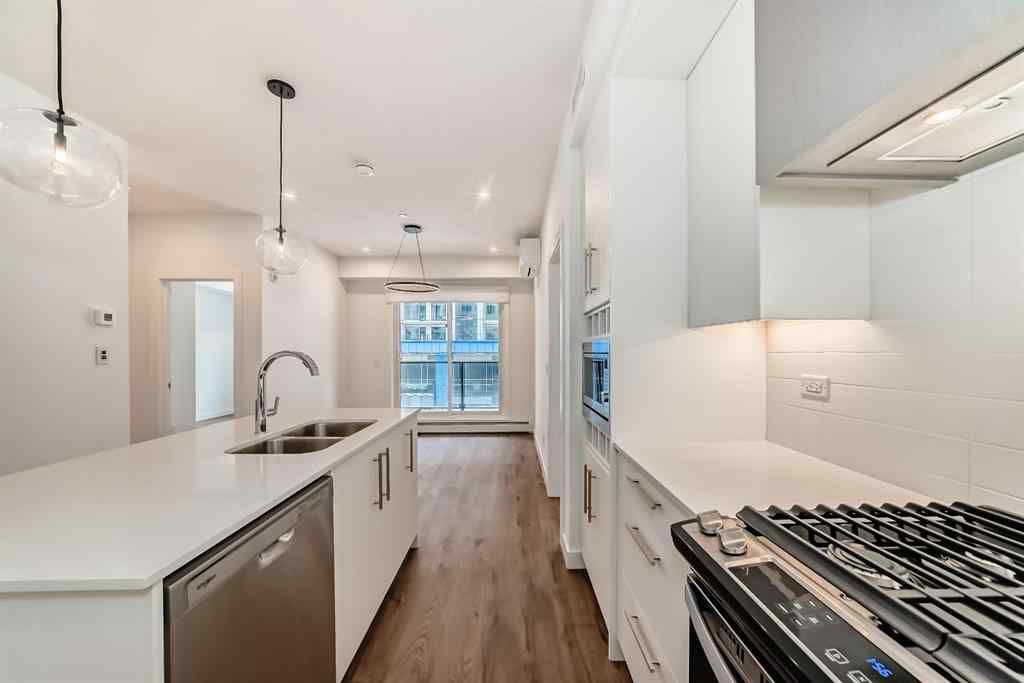 MLS® A2248724 - Unit #205 8370 Broadcast Avenue SW in West Springs Calgary, Residential