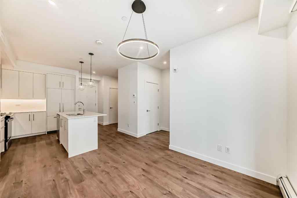 MLS® A2248724 - Unit #205 8370 Broadcast Avenue SW in West Springs Calgary, Residential