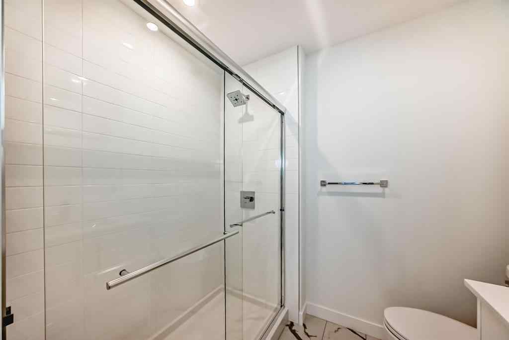 MLS® A2248724 - Unit #205 8370 Broadcast Avenue SW in West Springs Calgary, Residential
