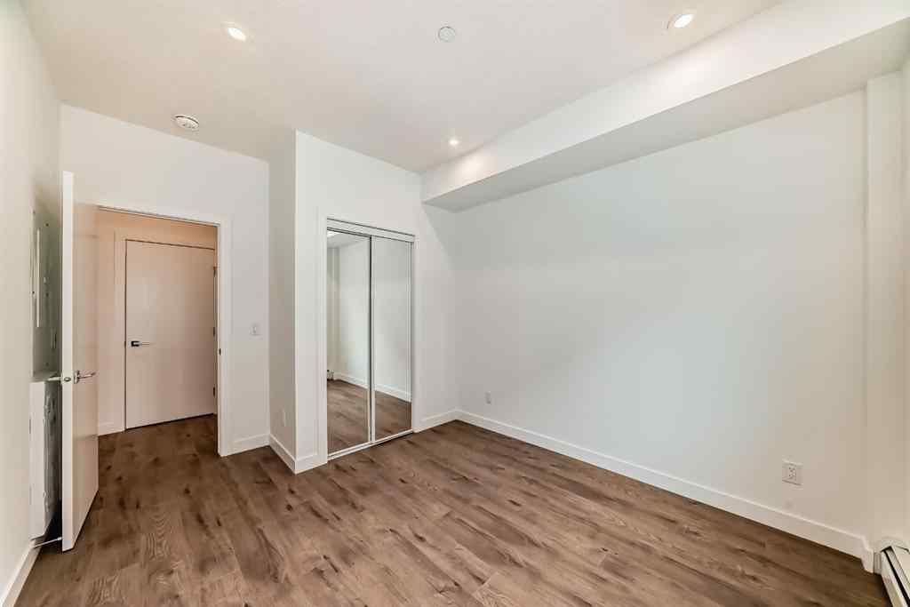 MLS® A2248724 - Unit #205 8370 Broadcast Avenue SW in West Springs Calgary, Residential