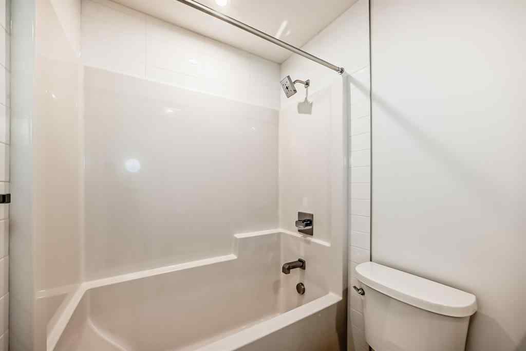 MLS® A2248724 - Unit #205 8370 Broadcast Avenue SW in West Springs Calgary, Residential