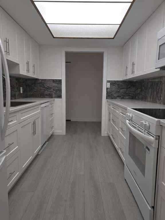 MLS® A2248729 - Unit #206 3730 50 Street NW in Varsity Calgary, Residential