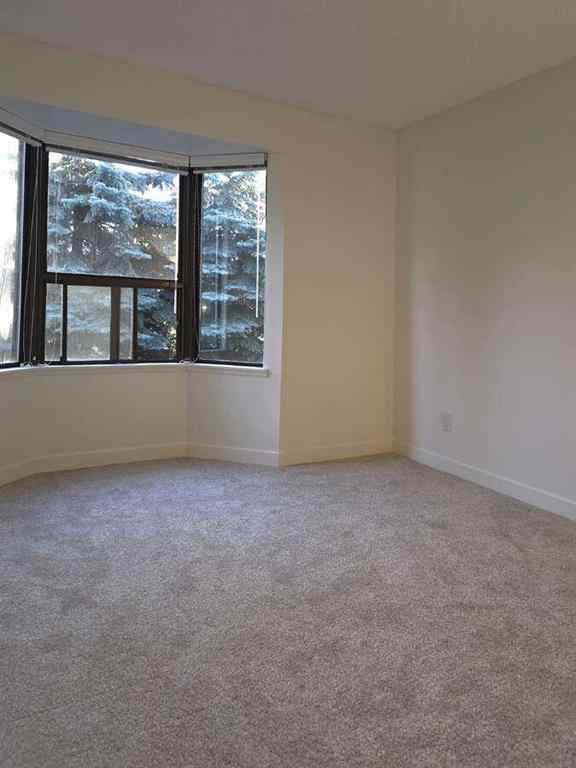 MLS® A2248729 - Unit #206 3730 50 Street NW in Varsity Calgary, Residential